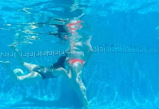 Metallic Swimsuit fucked in the pool